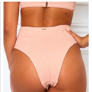 White fox swim bottom